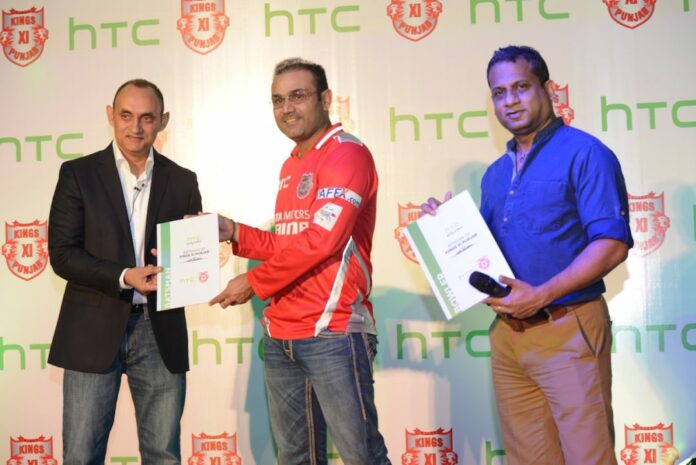 (L-R) Faisal Siddiqui,Vice President and Country Head, HTC India,Virendra Sehwag,Fraser Castellino,Chief Operating Officer,Kings XI Punjab